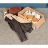 A box of miscellaneous to include Winalex Ware tea service, Paragon leather jacket, Portmerion