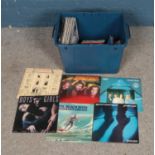 A quantity of records and singles of mainly pop to include Madonna, Abba, Bee Jees, etc.