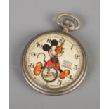 A Ingersoll Mickey Mouse pocket watch. Not working, missing second hand and glass.