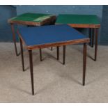 Three folding card tables including two felt topped examples.