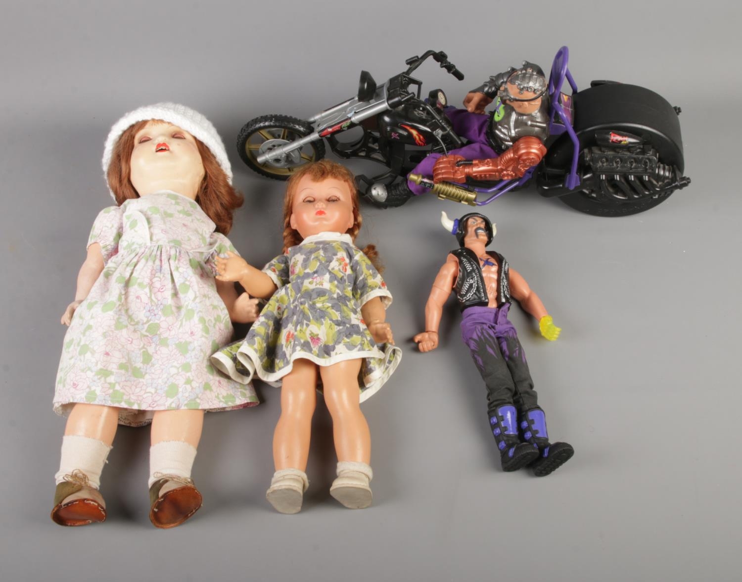 Two vintage dolls along with two Doctor X action figures including motorbike example.