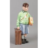 A Royal Doulton Limited Edition Figure titled: The Boy Evacuee HN3202 (8929/9500).