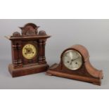 An oak cased dome top mantel clock along with a mahogany mantel clock.