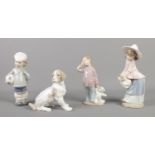Four Lladro and Nao by Lladro ceramic figures, to incude boy with football and tired boy with bear.