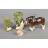 A collection of Sylvac ceramics including shire horse, rabbit and two swan vases.