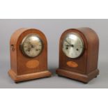 Two Edwardian dome top mantel clocks both having inlaid decoration.