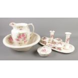 A Winchester pottery wash set decorated with roses.
