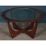 A mid century teak Astro style coffee table. Tired condition.