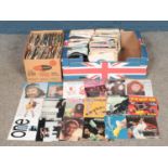 Two boxes of assorted single records. To include George Benson, Tiffany, Billy Joel, Supertramp