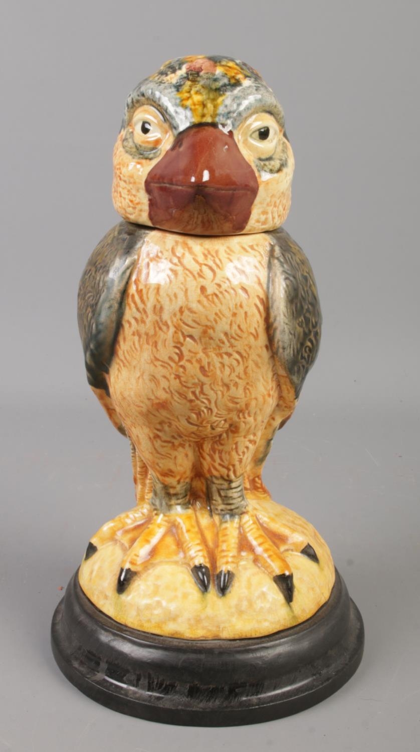A ceramic jar formed as a grotesque bird in the style of Martin Brothers. 24.5cm.