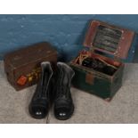 A WWII field telephones Set 'F' along with a metal ammo crate and pair of boots.