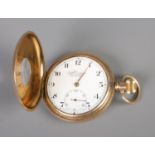 A H. Samuel Manchester Everite half hunter pocket watch with white enamel dial and roman numerals to