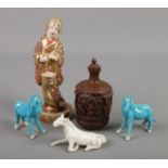 A small quantity of oriental items. Includes miniature ceramic horses, figure and a composite