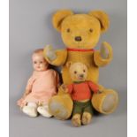 A large vintage Merry Thought Bear along with Armand Marseille doll stamped 551/4 and one other