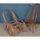 An Ercol spindle back dining chair along with a bamboo rocking chair frame.