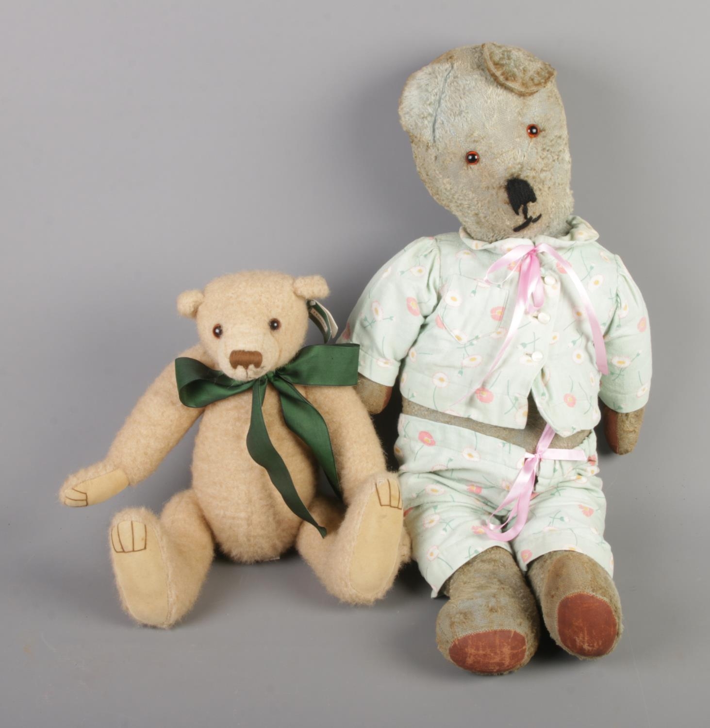 A large vintage blue teddy bear with growler along with smaller Harold bear.