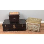 A tin trunk along with two ash boxes including decorative brass example.