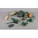 A quantity of military themed diecast and remote control toys. To include Tamiya remote control
