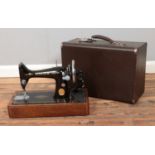 A cased Singer 99K 1939 sewing machine. Serial Number EC179508.
