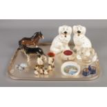 A tray of mostly Beswick ceramics including Penguin family, pair of comforter dogs and German