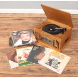 A Classic Collector's Edition record player and collection of records. Includes Shirley Bassey, John