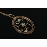 An Edwardian 9ct Gold, Moonstone and Pearl pendant on 9ct Gold chain. Total weight: 2.9g.