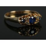 An Edwardian 18ct Gold, sapphire and diamond ring. Assayed Birmingham 1906. Size NÂ½. Total