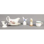A small collection of Royal Worcester ceramics. Includes 1885 gilt decorated teacup, 1049 bamboo