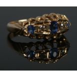 A George V 18ct Gold, Sapphire and Diamond five stone ring. Size M. Total weight: 3.1g.