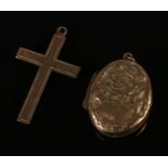 A 9ct locket and cross pendant. 3.9g