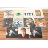 A collection of Beatles and Solo artists records. To include Rock and Roll, Revolver and Help!