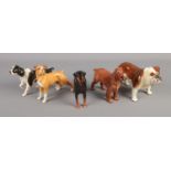 Five Beswick dog figures including Bulldog, Doberman, Boxer, etc. Good condition.