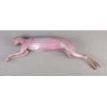 A fibreglass model formed as a skinned hare without ears.