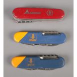 Three multi-tools including Swiss camping and Bauer examples.