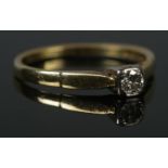 An 18ct Gold Diamond solitaire ring. Stone approximately 1/8ct. Size Q. Total weight: 2.6g