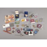 A collection of military, mostly Parachute Regiment, collectables including keyrings, badges,
