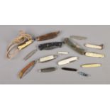 A collection of pocket knives including Radfords, Richards and various Sheffield made examples.