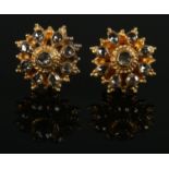 A pair of yellow gold and black diamond ear studs. Test to 22ct Gold. Total weight: 2.5g.