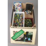 A box of marbles. Includes vintage examples.