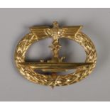 A German WWII Third Reich U Boat badge stamped Frank & Reif Stuttgart to reverse.