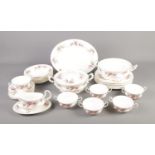 A quantity of Royal Albert dinner wares in the Lavender Rose pattern including tureens, cups and