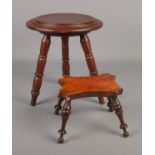 A Victorian burr walnut miniature stool with turned supports, engraved 1884 to underside along