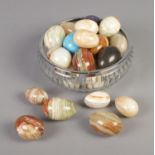 A cut glass bowl and box containing an assortment of hardstone eggs. Approx. 26 eggs.