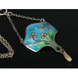 An art nouveau silver, enamel and pearl pendant on chain. Some wear to the enamel on the underside