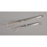 Two silver Swizzle sticks one hallmarked with continental 835 stamp, the other Birmingham 1983 by