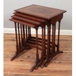 A mahogany nest of four tables. Some knocks to wood on top of tables.