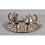 A four piece Eric Clements for Mappin & Webb silver plated tea service with tray.