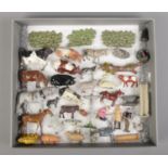 A collection of approximately 40 lead farmyard figures and accessories. Includes some examples