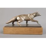 A silver plated car mascot in the form of a fox mounted on plinth. Approx. length 16cm.