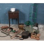 A collection of miscellaneous. Includes fishing trolley & waders, crate, metal box, brushes baring